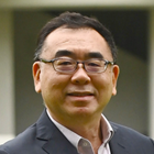 Dr Denis Hew